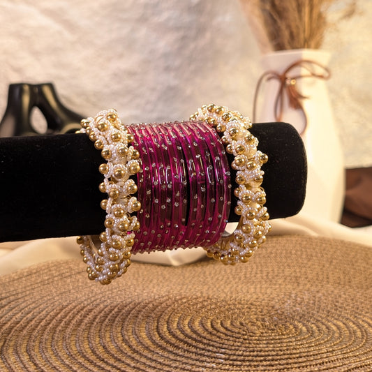 magenta glass and golden pearl kada bangles