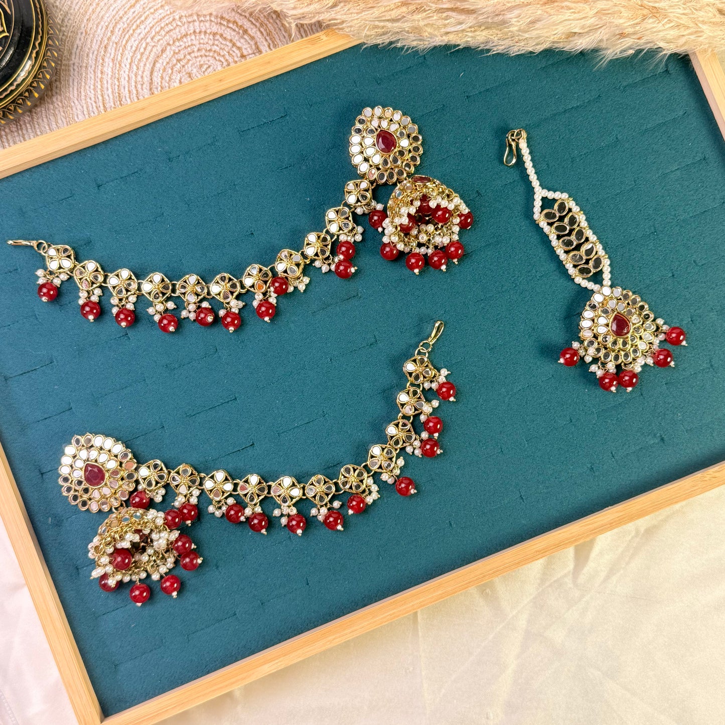 Radiant maroon jhumka Tikka Sahara Kundan Earrings