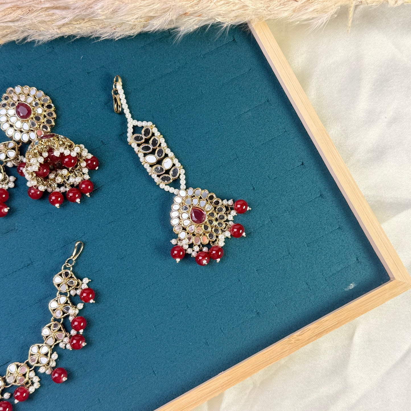Radiant maroon jhumka Tikka Sahara Kundan Earrings