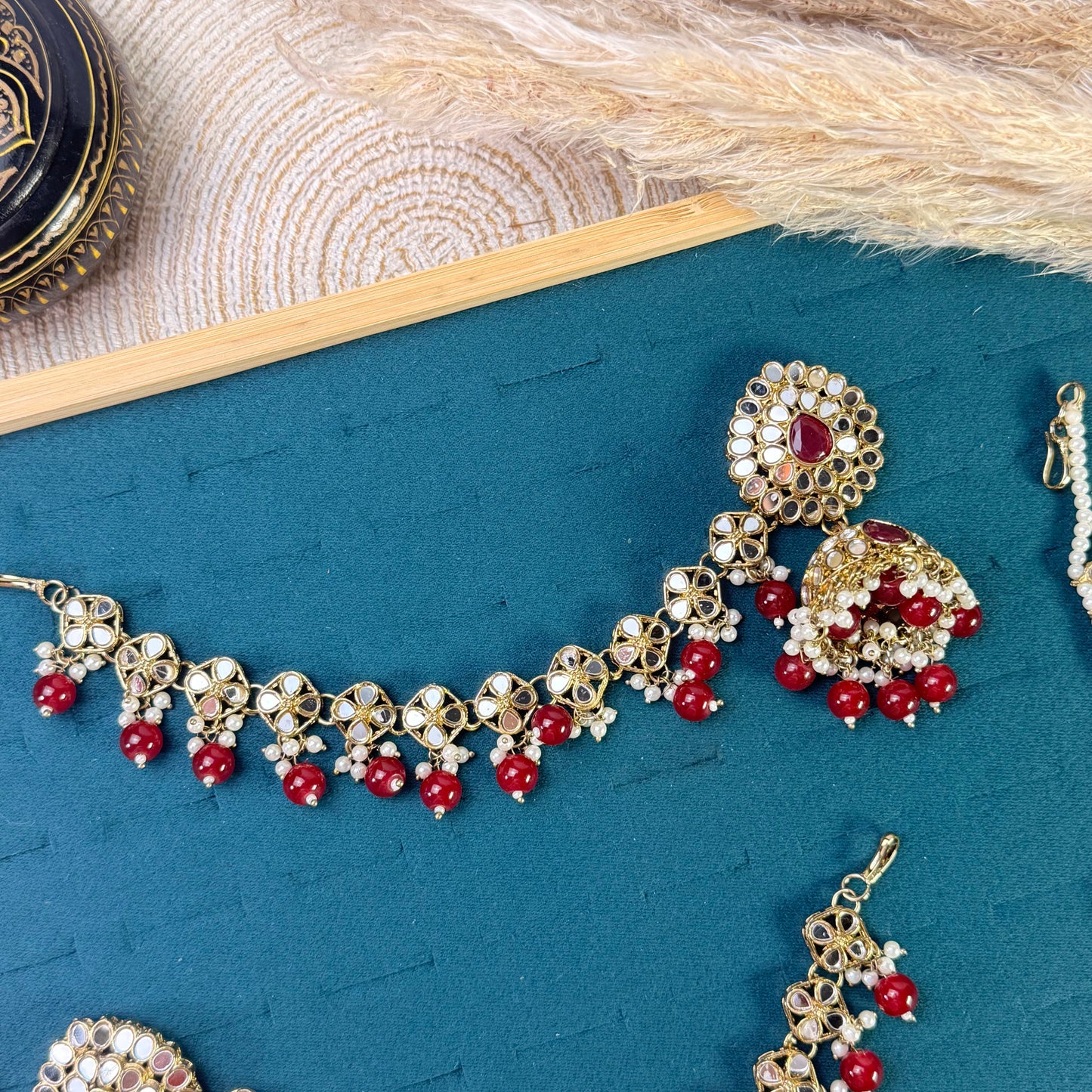 Radiant maroon jhumka Tikka Sahara Kundan Earrings