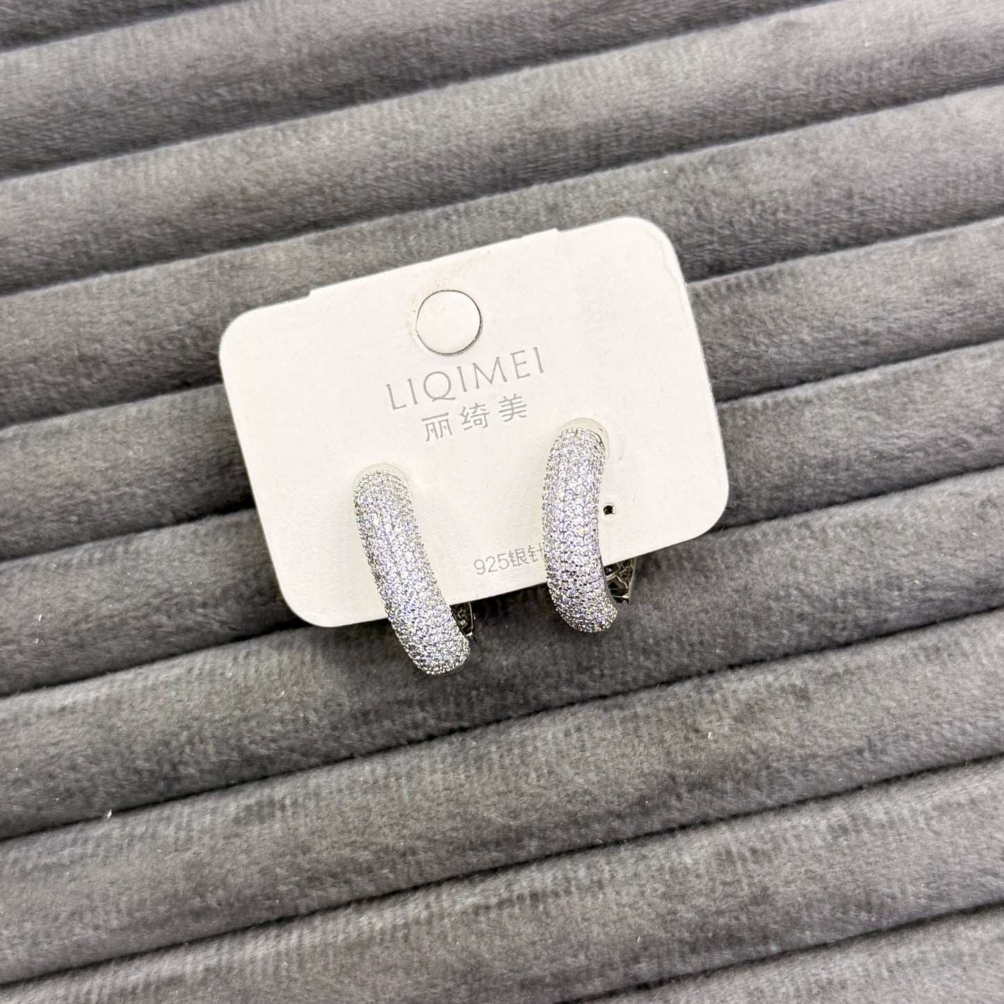 SILVER PAVÉ DOME HUGGIE EARRINGS