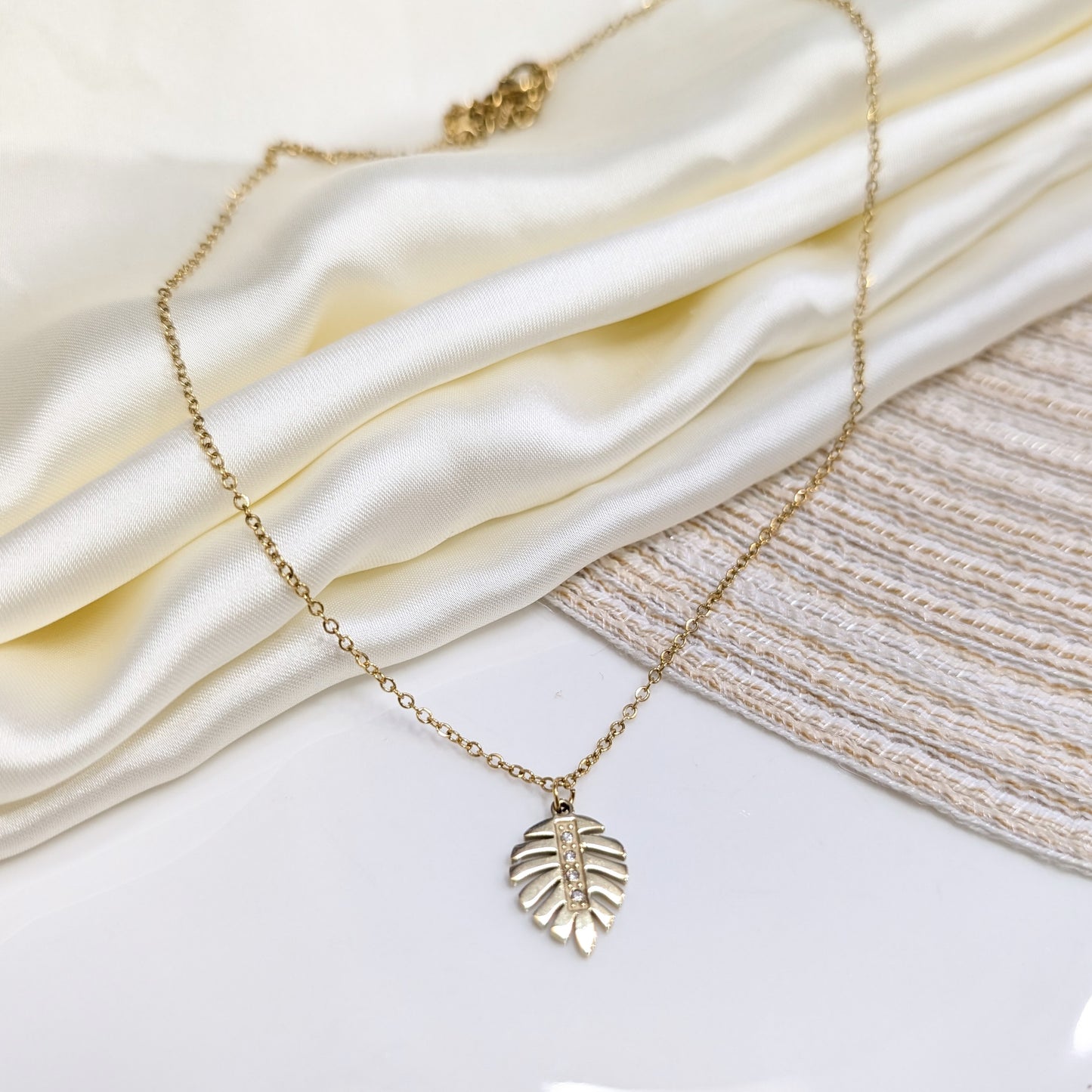 CRYSTAL PALM LEAF LOCKETS