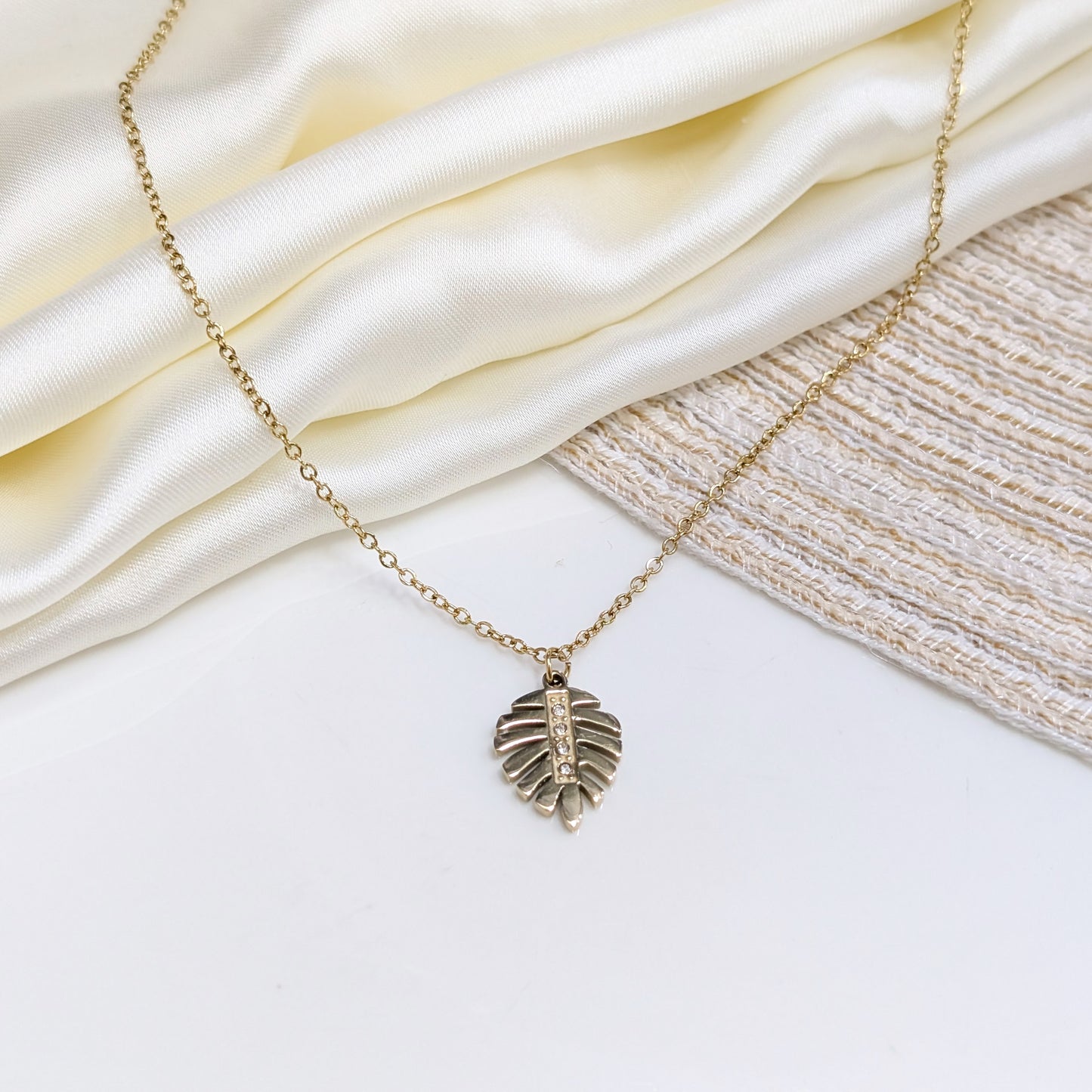 CRYSTAL PALM LEAF LOCKETS