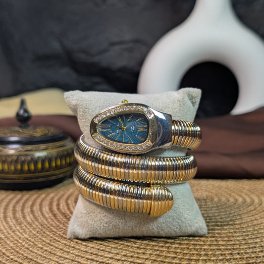 Turquoise two tone snake watch